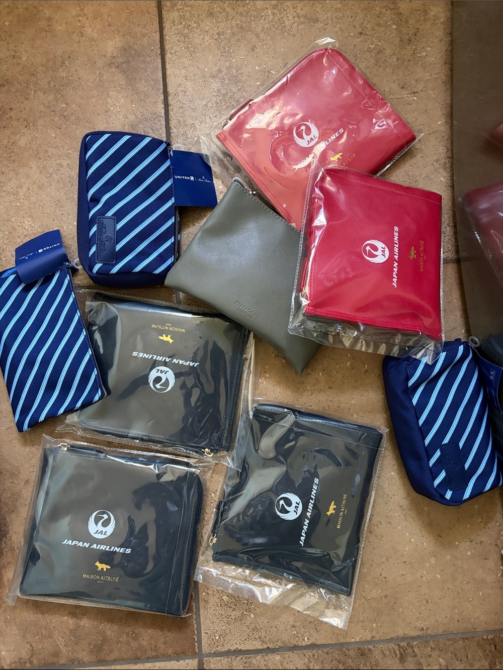9 amenity Travel Pouches - airlines - all together